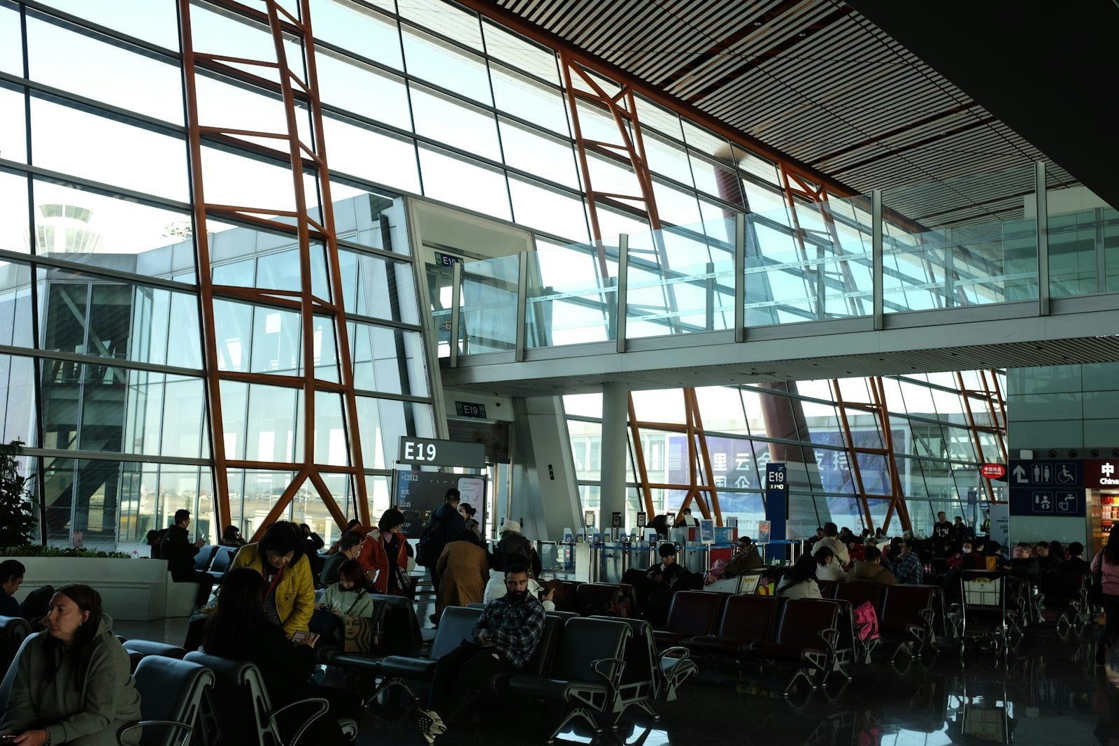 Group of business travelers reviewing an itinerary.