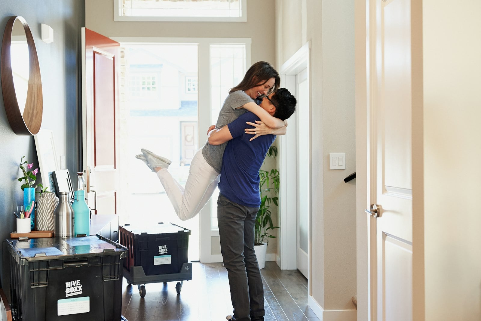 Professional or couple reviewing relocation plans and luggage.