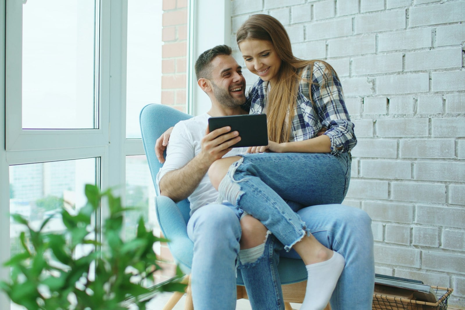 Buyer comparing property listings, floor plans, or neighborhoods.