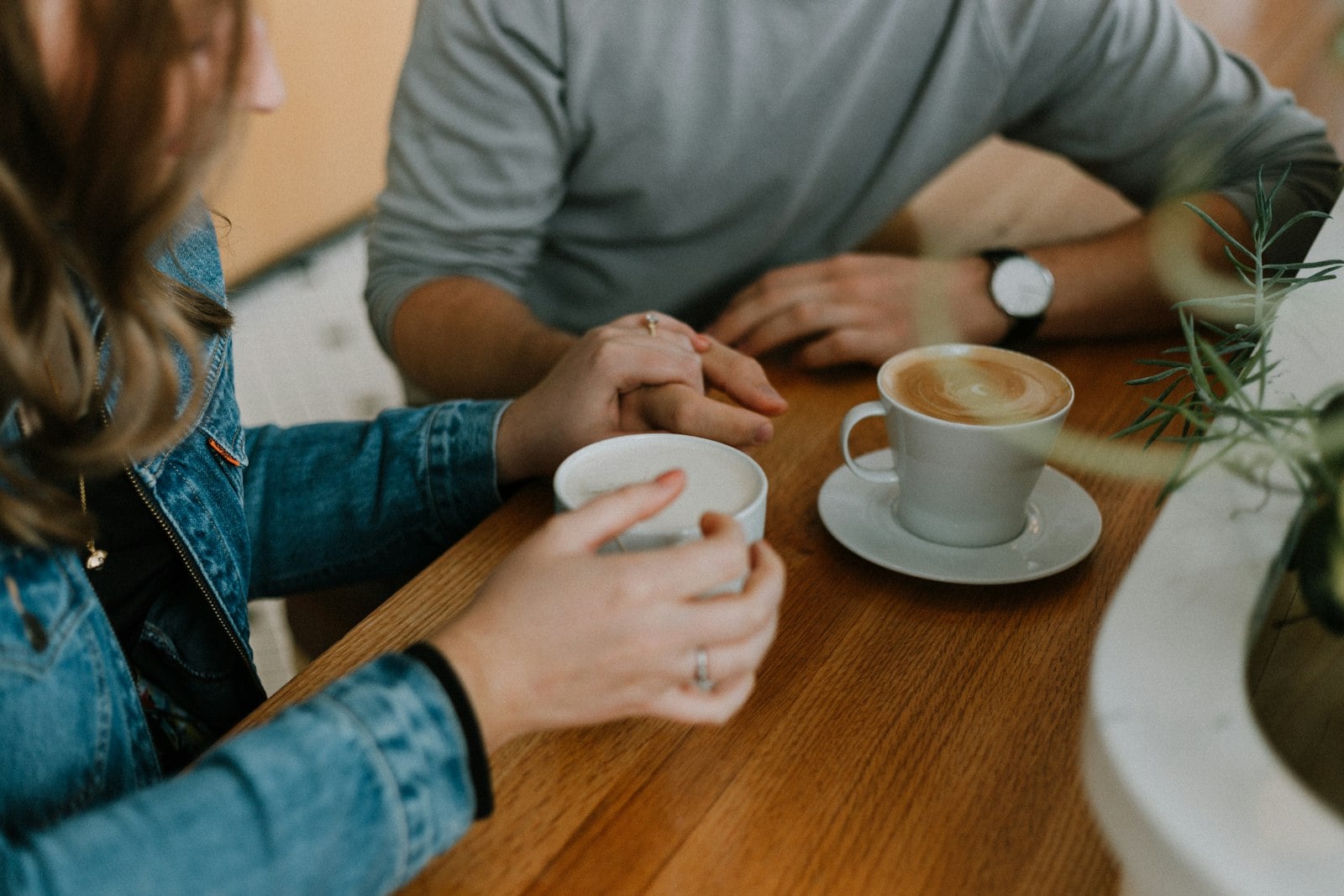 Two professionals meeting over coffee