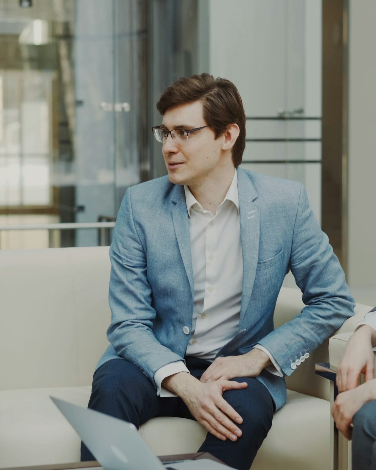 A professional in conversation with a partner